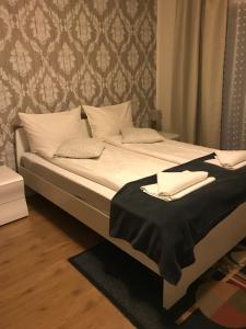 Łóżko lub łóżka w pokoju w obiekcie Tannenhof