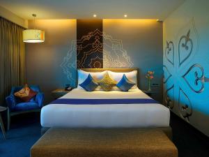 Grand Mercure Mysore - An Accor Brand客房内的一张或多张床位