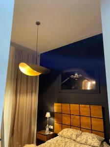 Postel nebo postele na pokoji v ubytování La dimora del Casanova B&B boutique