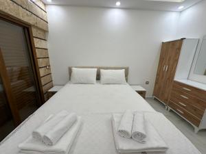 Postel nebo postele na pokoji v ubytování Kuşadası Deniz Tatil Evleri