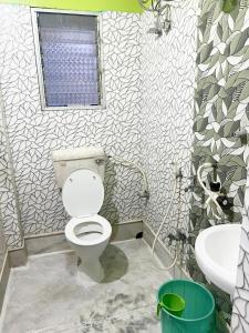 Koupelna v ubytování Radha Rani lodge
