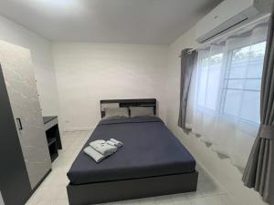 Katil atau katil-katil dalam bilik di Na Kluea Pool villa +7 gambar