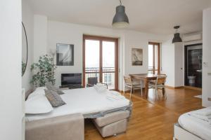 Ένα ή περισσότερα κρεβάτια σε δωμάτιο στο Ripamonti Apartments 66 - Milano