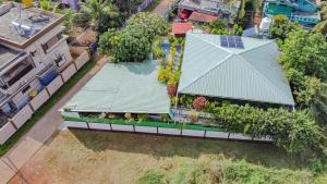 an overhead view of a house with a garden at UDUPI HOMESTAY Garden Villa in Udupi