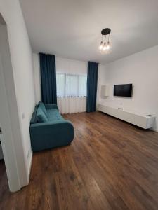 Et tv og/eller underholdning på Spacious Double Room by Confort ApartHotel