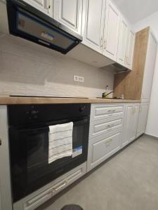 Køkken eller tekøkken på Spacious Double Room by Confort ApartHotel