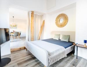 Postel nebo postele na pokoji v ubytování Bellevue & Classy Mountain View apartment