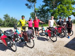 a group of people standing next to their bikes at Angelucci Agriturismo con Camere e Agri Camping in Lanciano