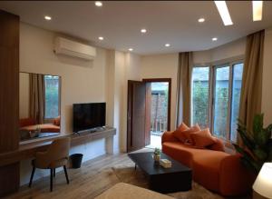 TV a/nebo společenská místnost v ubytování Maison 7 New Cairo