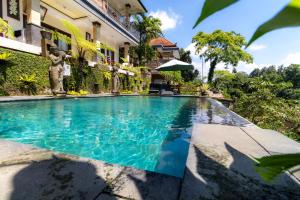Bazén v ubytování Doni House & Villas nebo v jeho okolí