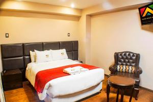 Katil atau katil-katil dalam bilik di Hotel Royal Qosqo