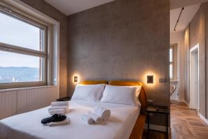 Posteľ alebo postele v izbe v ubytovaní Prestige Apartments Torino