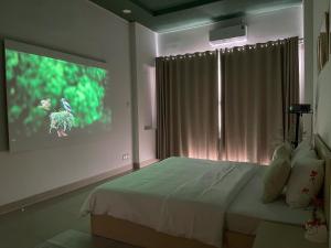 TV a/nebo společenská místnost v ubytování Ann Home + 37 fotografií