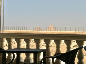 A balcony or terrace at Shiny Pyramids "New Pyramids Gate"