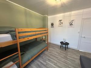 Postel nebo postele na pokoji v ubytování L'Échappée Creusoise