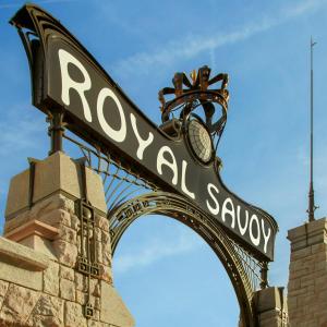 a street sign for regal savoy on top of a building at Royal Savoy Hotel & Spa in Lausanne