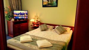 Posteľ alebo postele v izbe v ubytovaní Hotel Spinaker