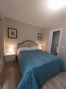 Postel nebo postele na pokoji v ubytování B&B Regina