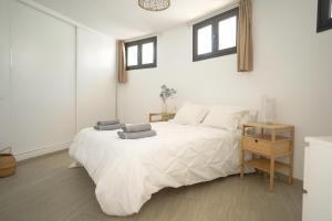 Posteľ alebo postele v izbe v ubytovaní Bungalow con vistas al mar