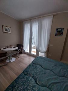 Postel nebo postele na pokoji v ubytování B&B Regina