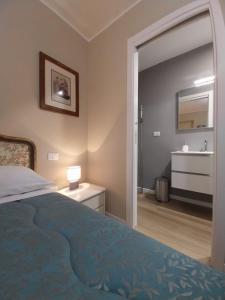 Postel nebo postele na pokoji v ubytování B&B Regina