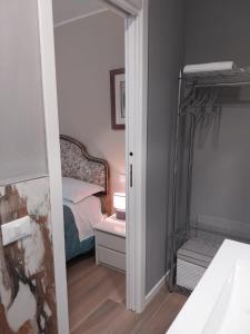 Postel nebo postele na pokoji v ubytování B&B Regina