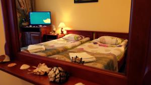 Posteľ alebo postele v izbe v ubytovaní Hotel Spinaker