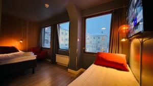 Voodi või voodid majutusasutuse Narvik Hotel Wivel toas