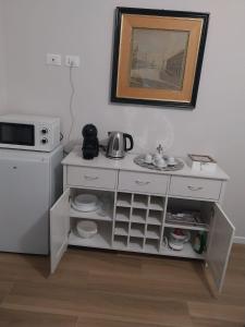 Kuchyň nebo kuchyňský kout v ubytování B&B Regina