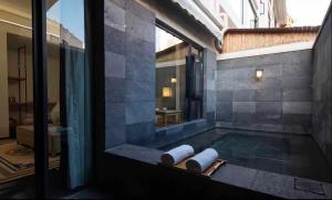 Fotografie z fotogalerie ubytování Yue Xin Yuan Spa Resort v destinaci Mile