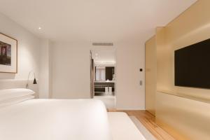 Posteľ alebo postele v izbe v ubytovaní BoHo Hotel Budapest - Small Luxury Hotels
