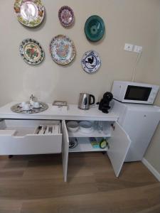 Kuchyň nebo kuchyňský kout v ubytování B&B Regina
