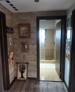 a bathroom with a walk in shower and a mirror at Hermosa casa en Palguin Bajo in Minetué +1 photo