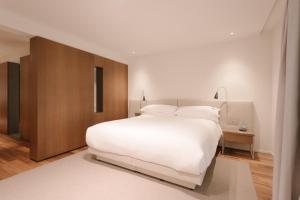 Posteľ alebo postele v izbe v ubytovaní BoHo Hotel Budapest - Small Luxury Hotels