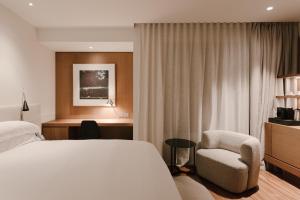 Posteľ alebo postele v izbe v ubytovaní BoHo Hotel Budapest - Small Luxury Hotels