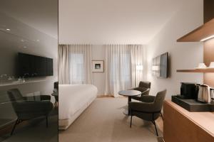 Televízia a/alebo spoločenská miestnosť v ubytovaní BoHo Hotel Budapest - Small Luxury Hotels