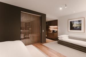 Posteľ alebo postele v izbe v ubytovaní BoHo Hotel Budapest - Small Luxury Hotels