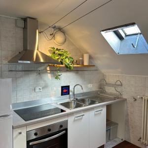 Kuchyň nebo kuchyňský kout v ubytování Venice Rooms + 35 fotografií