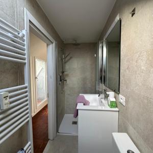 Koupelna v ubytování Venice Rooms