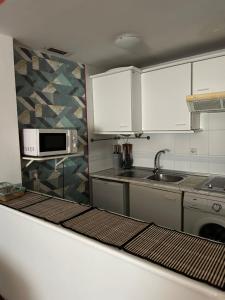 Nhà bếp/bếp nhỏ tại Apartamento cerca del aereopuerto