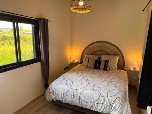 Postel nebo postele na pokoji v ubytování La VillaGeoise