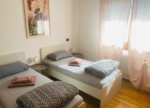 Postel nebo postele na pokoji v ubytování Casa Meja Apartment