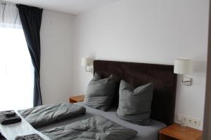 Postel nebo postele na pokoji v ubytování Burghotel - Das Original
