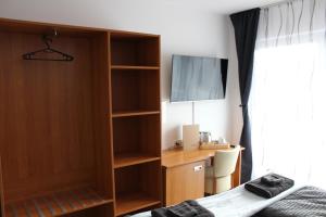 Postel nebo postele na pokoji v ubytování Burghotel - Das Original