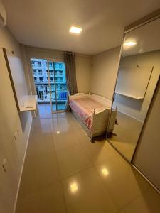 Postel nebo postele na pokoji v ubytování Solarium Residence
