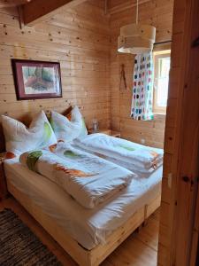 Postel nebo postele na pokoji v ubytování Chalet Siebenschläfer + 37 fotografií