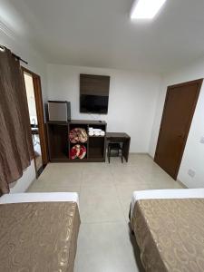TV a/nebo společenská místnost v ubytování Hotel Holiday Foz