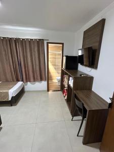 Postel nebo postele na pokoji v ubytování Hotel Holiday Foz