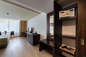 Kuchyň nebo kuchyňský kout v ubytování Hotel Estelar Milla De Oro