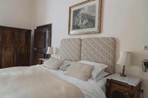 Posteľ alebo postele v izbe v ubytovaní Schloss Ernegg